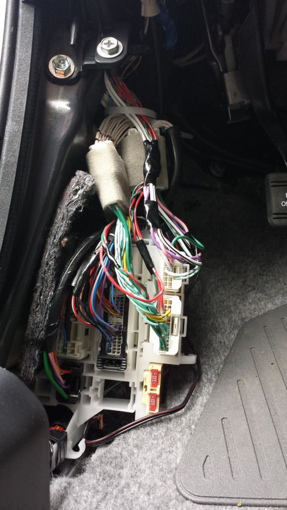 Two lone fuses behind left kick panel PriusChat